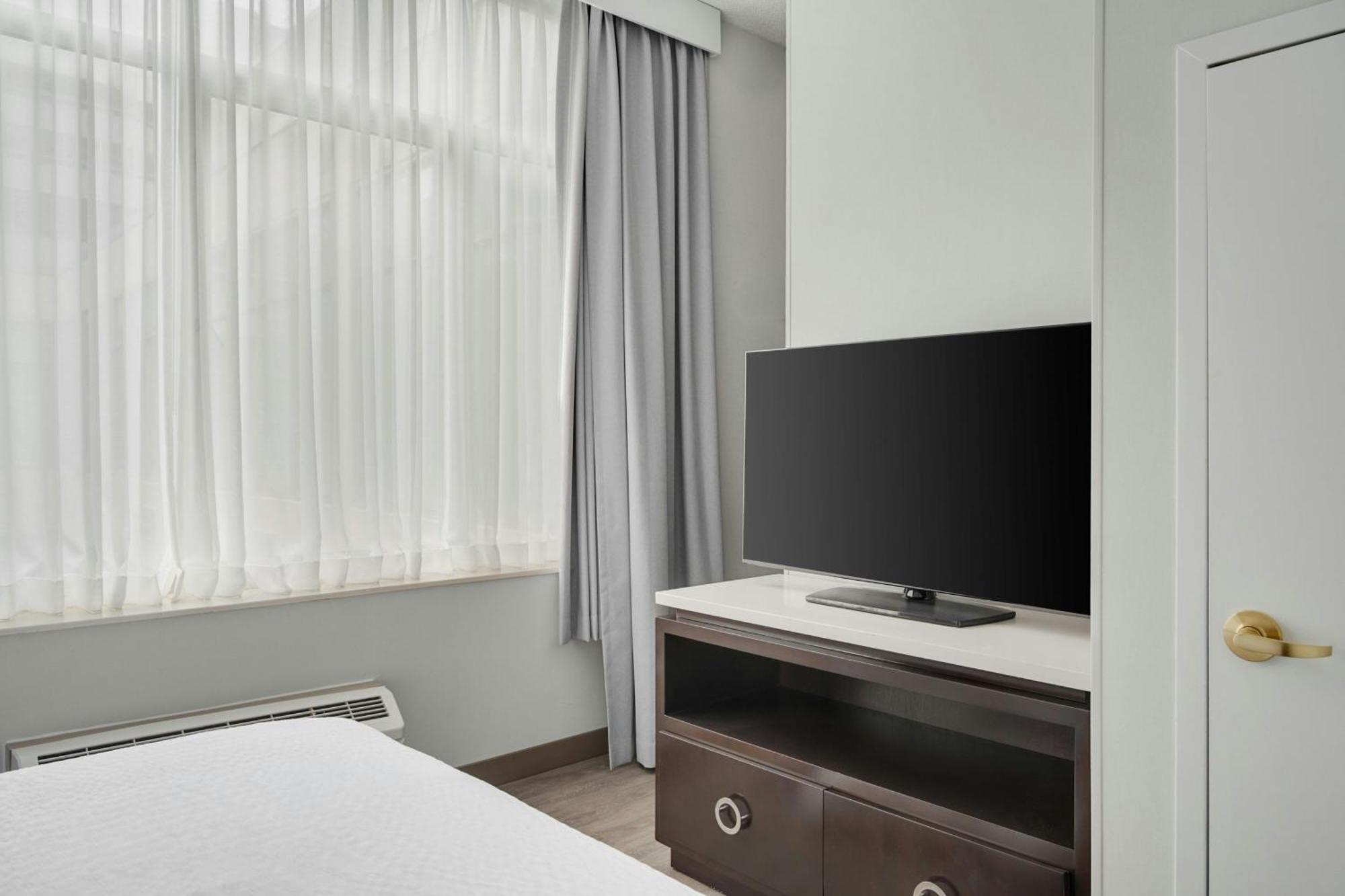 King Suite with Roll-In Shower and Sofa Bed - Mobility Access/Hearing Accessible