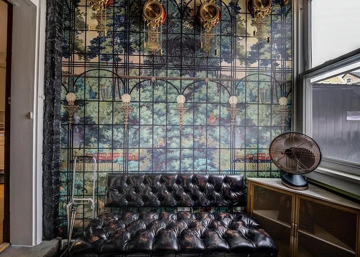 The Twin Lions: Bespoke Travel Lodge W/ Speakeasy*
